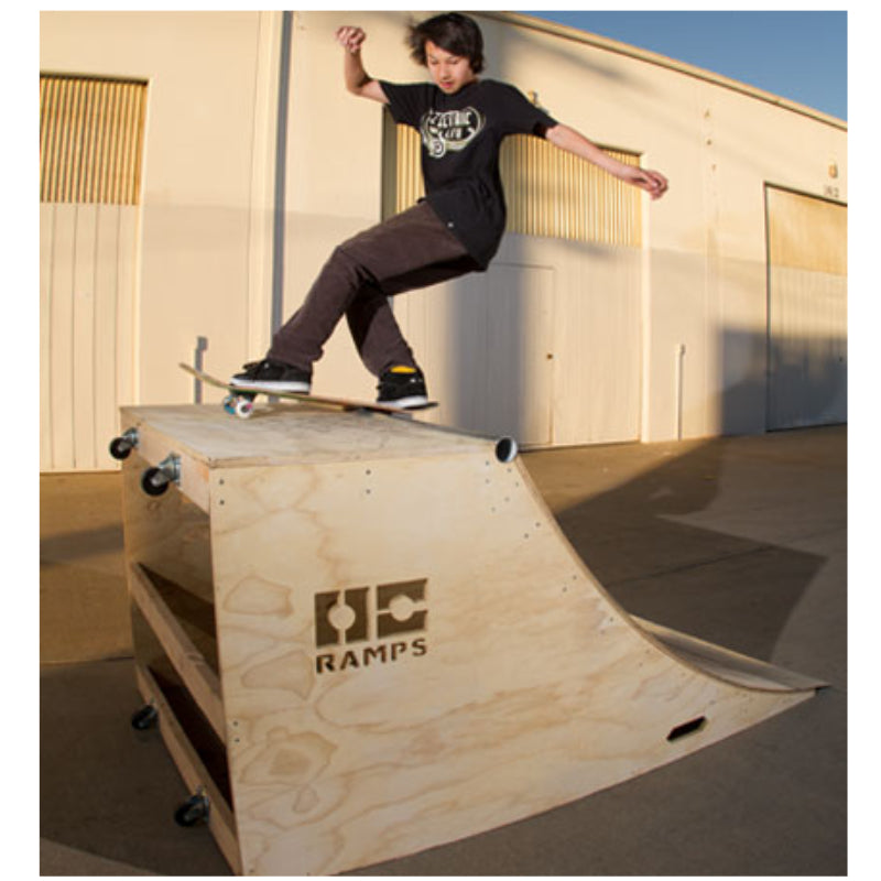 upclose skater on 4 foot wide 3 foot tall quarter pipe skate ramp with castor wheels by OC Ramps