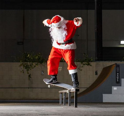 Santa Skateboarding into Christmas