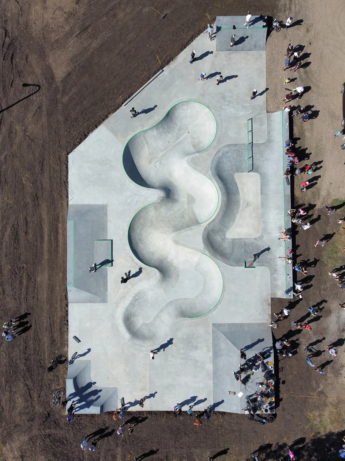 Completed concrete skatepark with curved ramps and bowls, in Cherokee, Iowa
