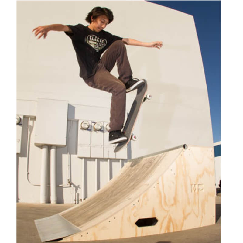 OC Ramps Quarter Pipe Ramps – Two 3 Foot — action shot with skater — backyard quarter pipe ramp kit