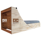 Rear three-quarter view of the Quarter Pipe Bed showing the open back of the headboard