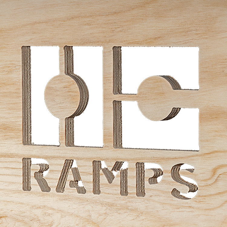 OC Ramps logo cut into the wooden side of the Quarter Pipe Bed