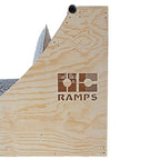 Close view of the Quarter Pipe Bed wooden side panel, curved headboard and OC Ramps logo