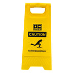 Front view of the yellow OC Ramps Caution Skateboarding sign