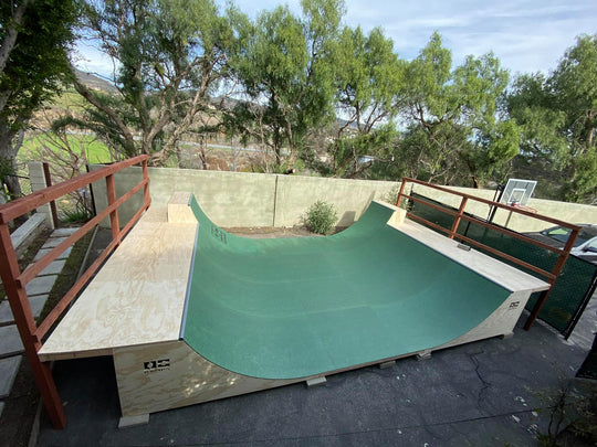 OC Ramps halfpipe with top layer of Green Gatorskins in 4ft x 8ft panel sheets