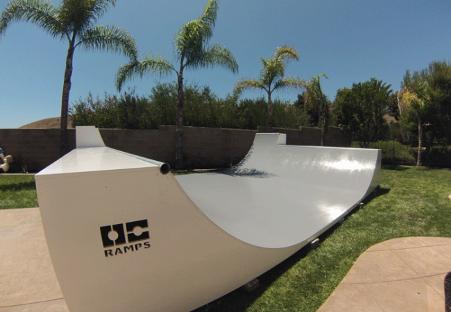 OC Ramps 16 foot wide half pipe with double extensions and topped with colored Skate Paint