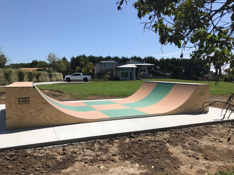 OC Ramps halfpipe with top layer Gatorskins in 4ft x 8ft panel sheets with checkered pattern
