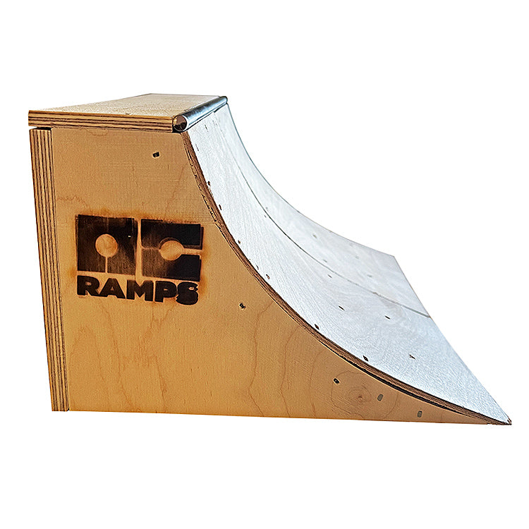 Side view of OC Ramps hand crafted plywood Fingerboard Quarter Pipe with coping