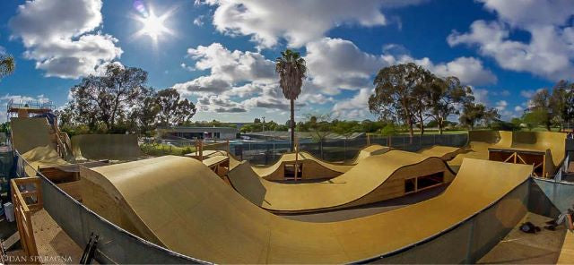 OC Ramps Gator Skins (Pre-Drilled) — action shot with skater — Gator Skin skate ramp surface
