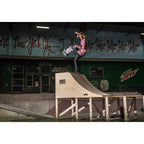 OC Ramps Quarter Pipe Ramp – 4ft Wide — action shot with skater — backyard quarter pipe ramp kit