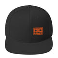 Black flat-brim snapback with an orange OC Ramps logo on the front