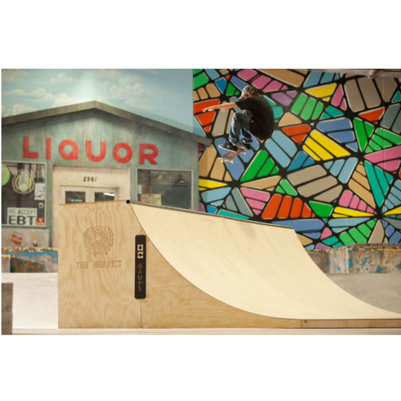 OC Ramps Halfpipe 5′ Tall — action shot with skater — backyard half pipe ramp kit